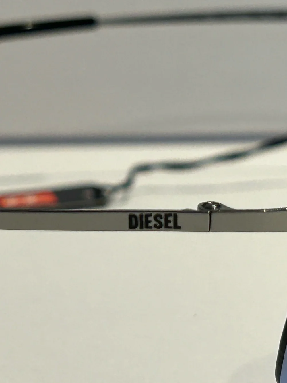 Diesel Gunmetal Frame Blue Gradient Lens Rimless Sunglasses -Kusini